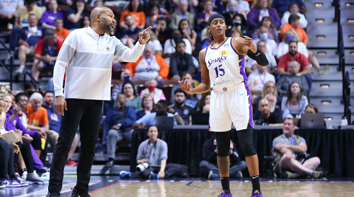 Derek Fisher of the Sparks coaches Brittney Sykes